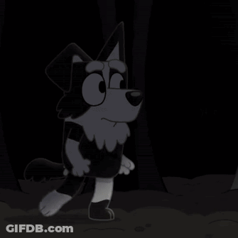 A Black And White Cartoon Dog Is Standing In Front Of A Tree . GIF