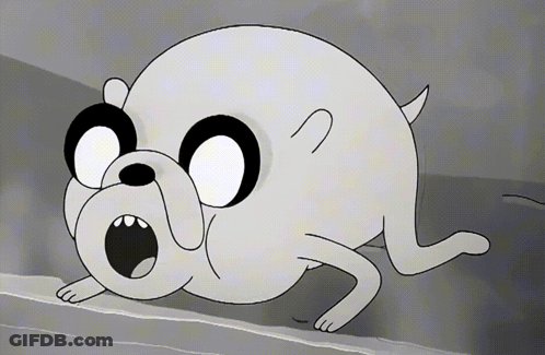 A Black And White Cartoon Dog With A Surprised Expression On His Face GIF
