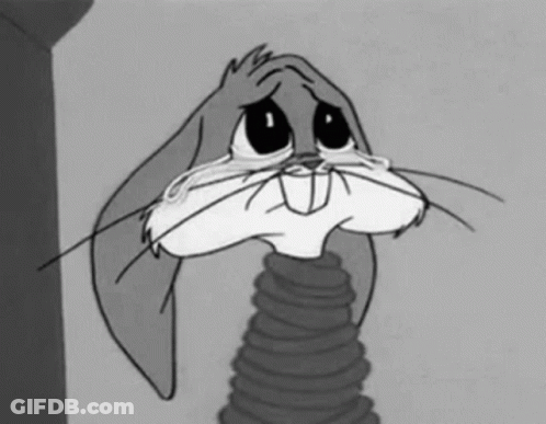 A Black And White Cartoon Of Bugs Bunny Crying With His Eyes Closed GIF