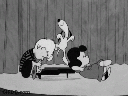 A Black And White Cartoon Of Snoopy And Lucy Playing Piano GIF