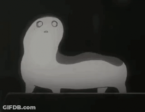 A Black And White Drawing Of A Cat With A Surprised Look On Its Face . GIF