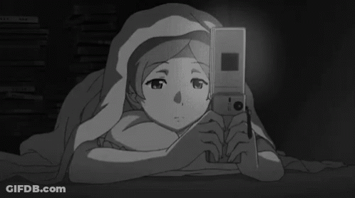 A Black And White Drawing Of A Girl Laying Under A Blanket Holding A Cell Phone GIF