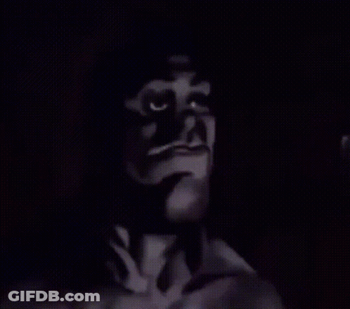 A Black And White Drawing Of A Man With A Serious Expression On His Face GIF
