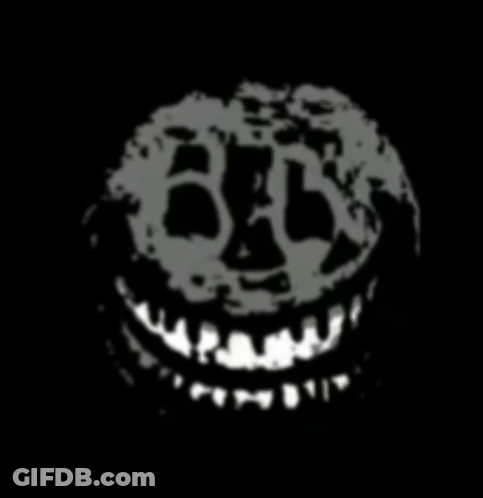 A Black And White Drawing Of A Skull With A Smile On It 'S Face GIF