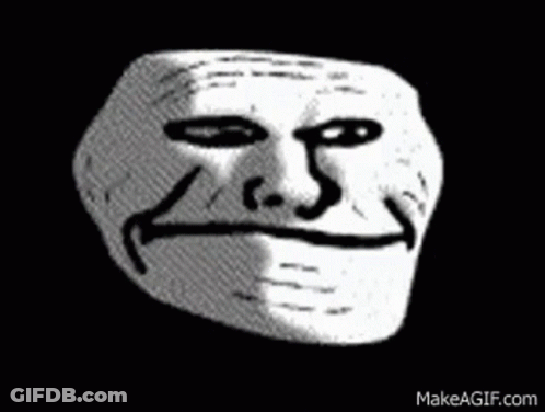 A Black And White Drawing Of A Troll Face With A Big Smile . GIF