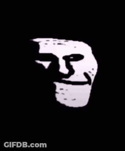 A Black And White Drawing Of A Troll Face With A Smiley Face GIF