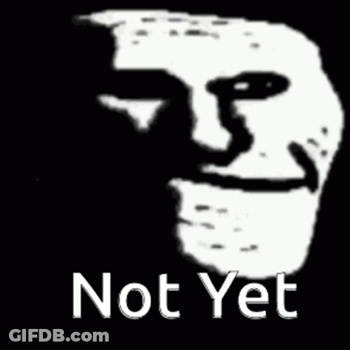 A Black And White Drawing Of A Troll Face With The Words `` Not Yet '' Written Below It . GIF