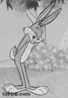 A Black And White Drawing Of Bugs Bunny Standing In The Grass . GIF