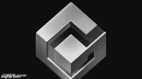 A Black And White Image Of A Cube With A Hole In It . GIF