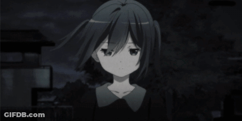 A Black And White Image Of A Girl With Pigtails Looking At The Camera GIF