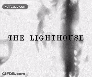 A Black And White Image Of A Lighthouse With Smoke Coming Out Of It GIF