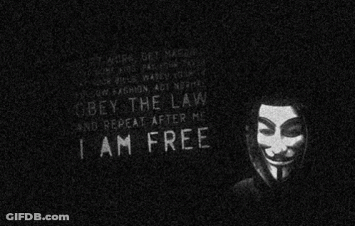 A Black And White Image Of A Man With A Mask And The Words Obey The Law And Repeat After Me GIF