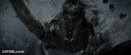 A Black And White Image Of A Monster With Sharp Claws GIF