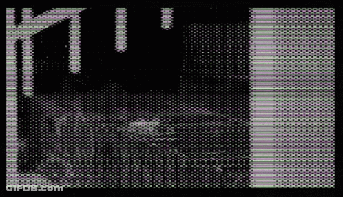A Black And White Image Of A Person 'S Face With A Purple And White Pattern GIF