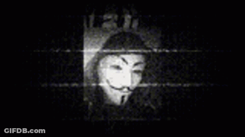 A Black And White Image Of A Person Wearing A Mask GIF