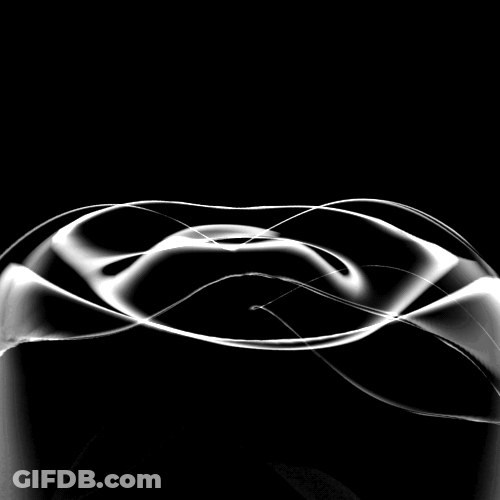 A Black And White Image Of A Swirl GIF