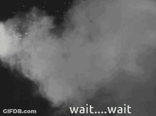 A Black And White Image Of Smoke With The Words Wait Wait GIF