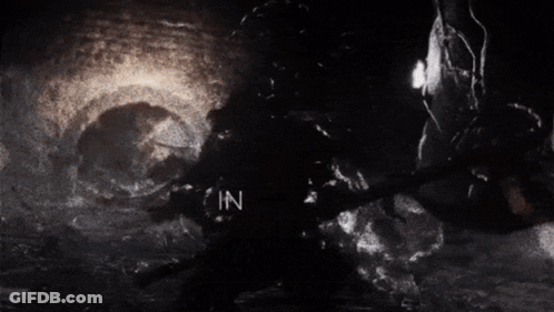 A Black And White Image With The Words " In Death " On It GIF