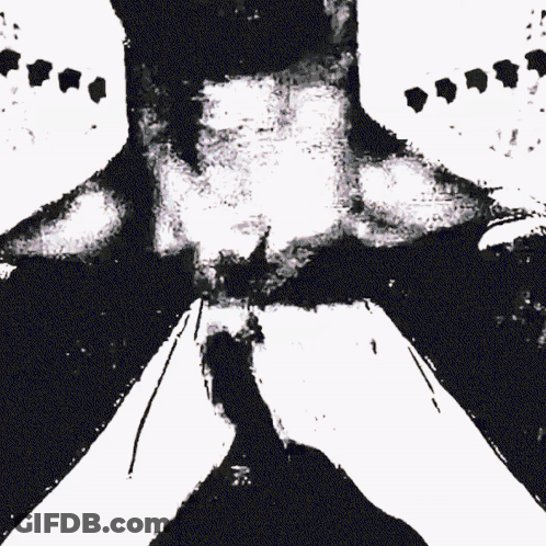 A Black And White Painting Of A Person 'S Torso GIF