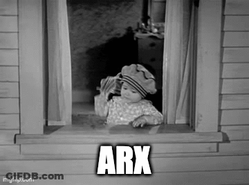 A Black And White Photo Of A Baby In A Hat Looking Out Of A Window With The Word Arx Above Him . GIF
