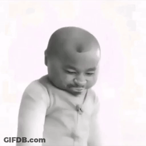 A Black And White Photo Of A Baby Making A Funny Face With His Eyes Closed . GIF