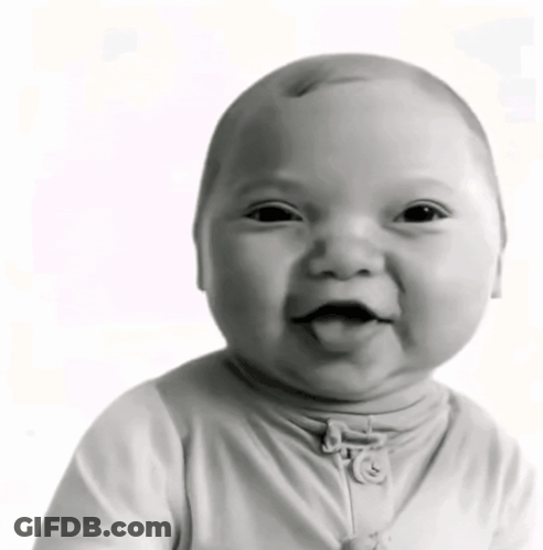 Black And White Photo Of Smiling Baby GIF