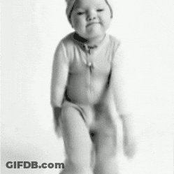 A Black And White Photo Of A Baby Wearing A Hat GIF