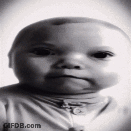Black And White Baby In White Sweater GIF