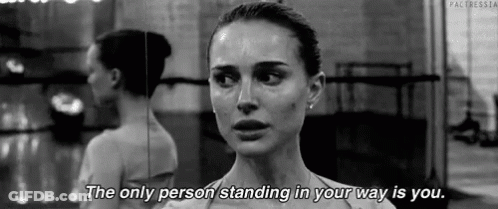 A Black And White Photo Of A Ballerina With The Words `` The Only Person Standing In Your Way Is You . '' GIF