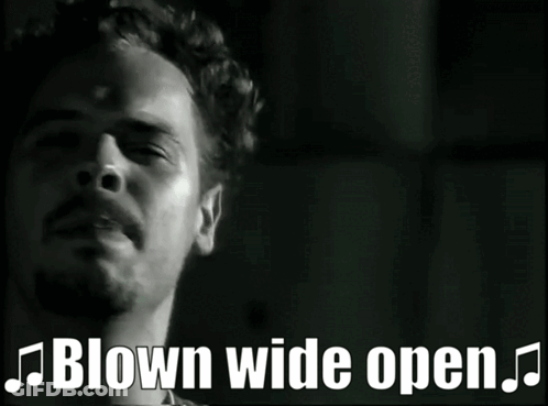 A Black And White Photo Of A Band With The Words Blown Wide Open Below Them GIF