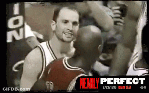 A Black And White Photo Of A Basketball Player With Nearly Perfect Written In Red GIF