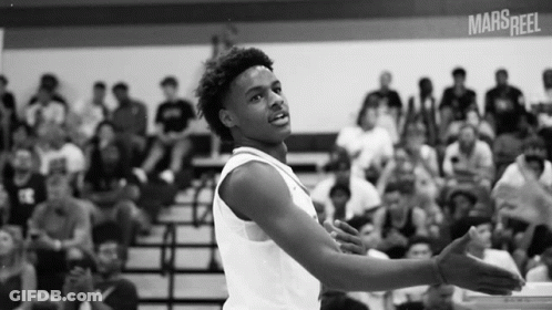 A Black And White Photo Of A Basketball Player With The Word Mars Reel On The Bottom Left GIF