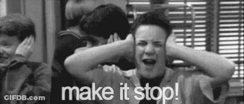 A Black And White Photo Of A Boy Covering His Ears With His Hands And The Words `` Make It Stop ! '' GIF