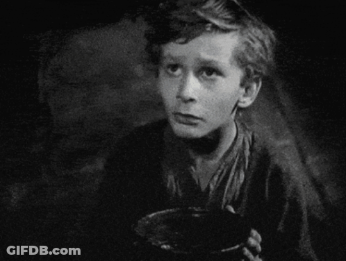 A Black And White Photo Of A Boy Holding A Bowl With The Words Please Sir Behind Him GIF