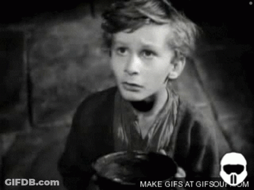 A Black And White Photo Of A Boy Holding A Cup With The Words Make Gifs At Gifsoun.com Below Him GIF