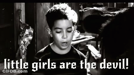 A Black And White Photo Of A Boy With The Words `` Little Girls Are The Devil '' Written On It . GIF