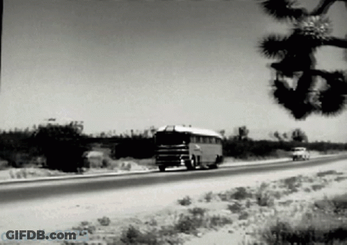 A Black And White Photo Of A Bus On A Highway With The Watermark Cravelle205 GIF