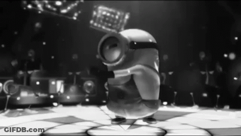A Black And White Photo Of A Cartoon Character Dancing On A Dance Floor . GIF