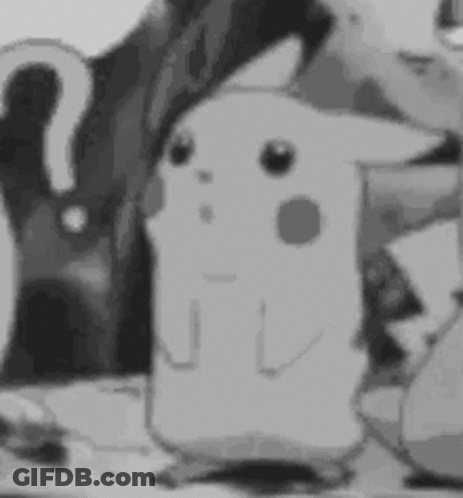 A Black And White Photo Of A Cartoon Character Standing Next To A Person . GIF