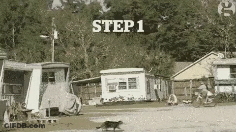 A Black And White Photo Of A Cat Running In Front Of A Trailer Park With The Words Step 1 Written Above It . GIF