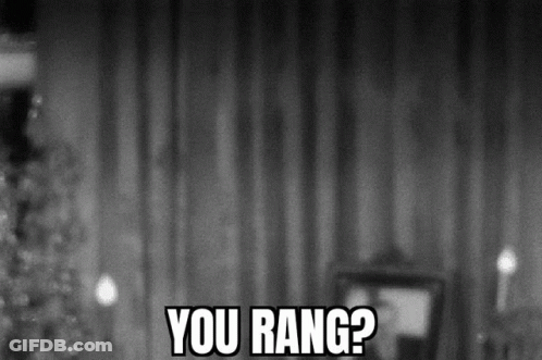 A Black And White Photo Of A Christmas Tree With The Words `` You Rang ? '' GIF