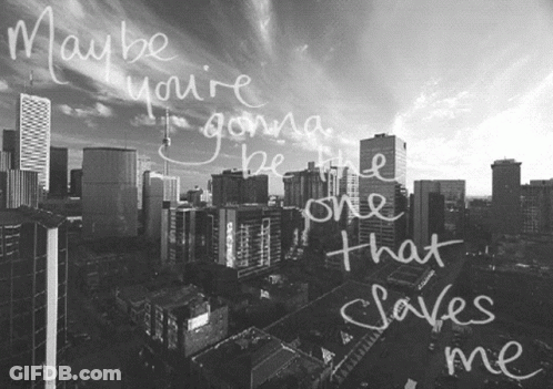 A Black And White Photo Of A City With The Words Maybe You 'Re Gonna Be The One That Saves Me Written On It GIF