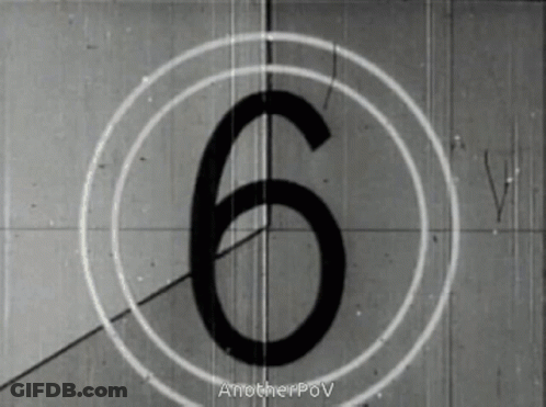 A Black And White Photo Of A Countdown With The Number 6 GIF