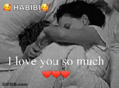 A Black And White Photo Of A Couple Hugging With The Words " I Love You So Much " On The Bottom GIF