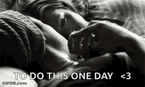 A Black And White Photo Of A Couple Sleeping On A Bed With The Words `` To Do This One Day < 3 '' . GIF