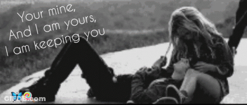 A Black And White Photo Of A Couple With The Words Your Mine And I Am Yours GIF