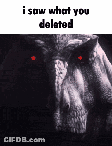 A Black And White Photo Of A Dinosaur With Red Eyes And The Words " I Saw What You Deleted " GIF