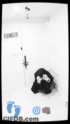 A Black And White Photo Of A Door That Says Drseay On It GIF