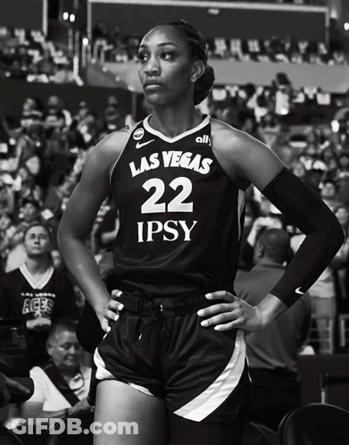 A Black And White Photo Of A Female Basketball Player Wearing A Las Vegas 22 Jersey GIF