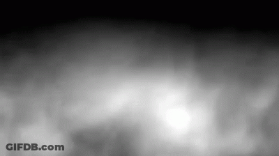 A Black And White Photo Of A Foggy Sky GIF